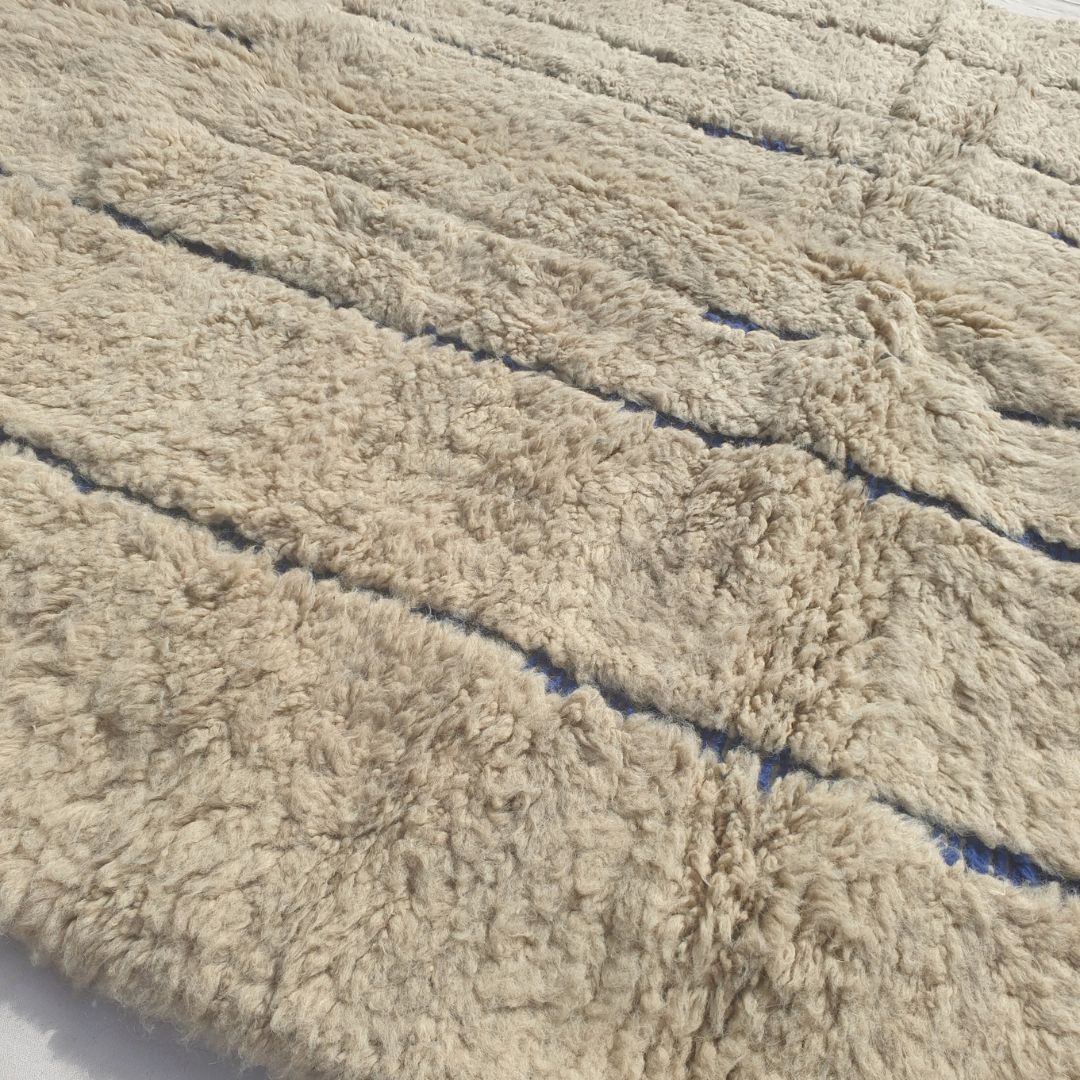 Ifawa - Beni Ourain Rug with Tonal Beige Field and Rare Blue Line Accents - Handwoven Berber Carpet | 6'6"x10'5" Ft | 198x317 cm