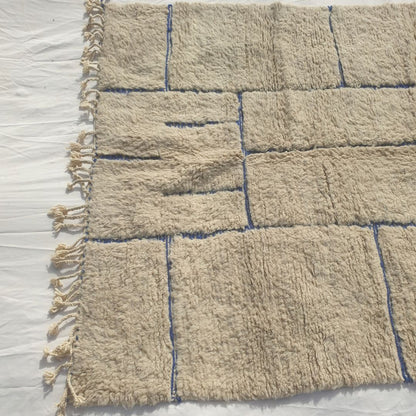 Ifawa - Beni Ourain Rug with Tonal Beige Field and Rare Blue Line Accents - Handwoven Berber Carpet | 6'6"x10'5" Ft | 198x317 cm