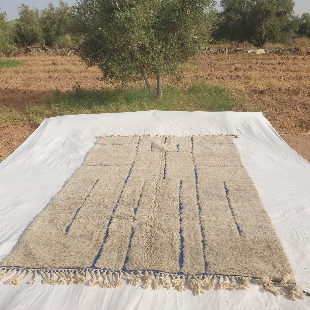 Ifawa - Beni Ourain Rug with Tonal Beige Field and Rare Blue Line Accents - Handwoven Berber Carpet | 6'6"x10'5" Ft | 198x317 cm