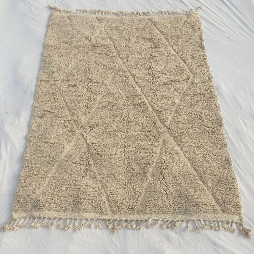 Authentic Beni Ourain Moroccan rug 207x281 cm laid flat - warm ivory and greige undyed wool base with a full-field classic diamond trellis in carved pile relief, the most iconic Beni Ourain composition handwoven in Morocco by Berber women