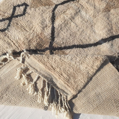 Handwoven fringes and thick plush edge of 6x9 high-quality Beni Ourain Moroccan rug