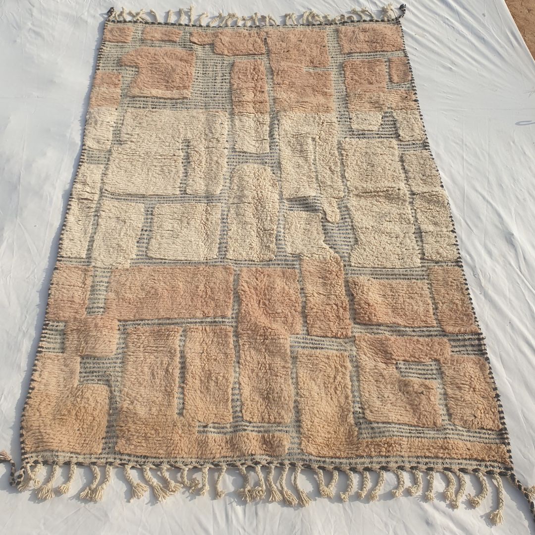 Authentic Beni Ourain Moroccan rug 196x280 cm laid flat - two-tone block patchwork in soft blush-rose and natural ivory/white wool with a grey-blue grid, handwoven in Morocco by Beni Ourain Berber women