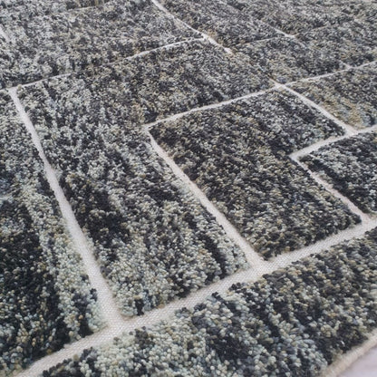 Ultra-thick fluffy pile on charcoal black geometric Beni Ourain Moroccan shag rug, luxury wool texture