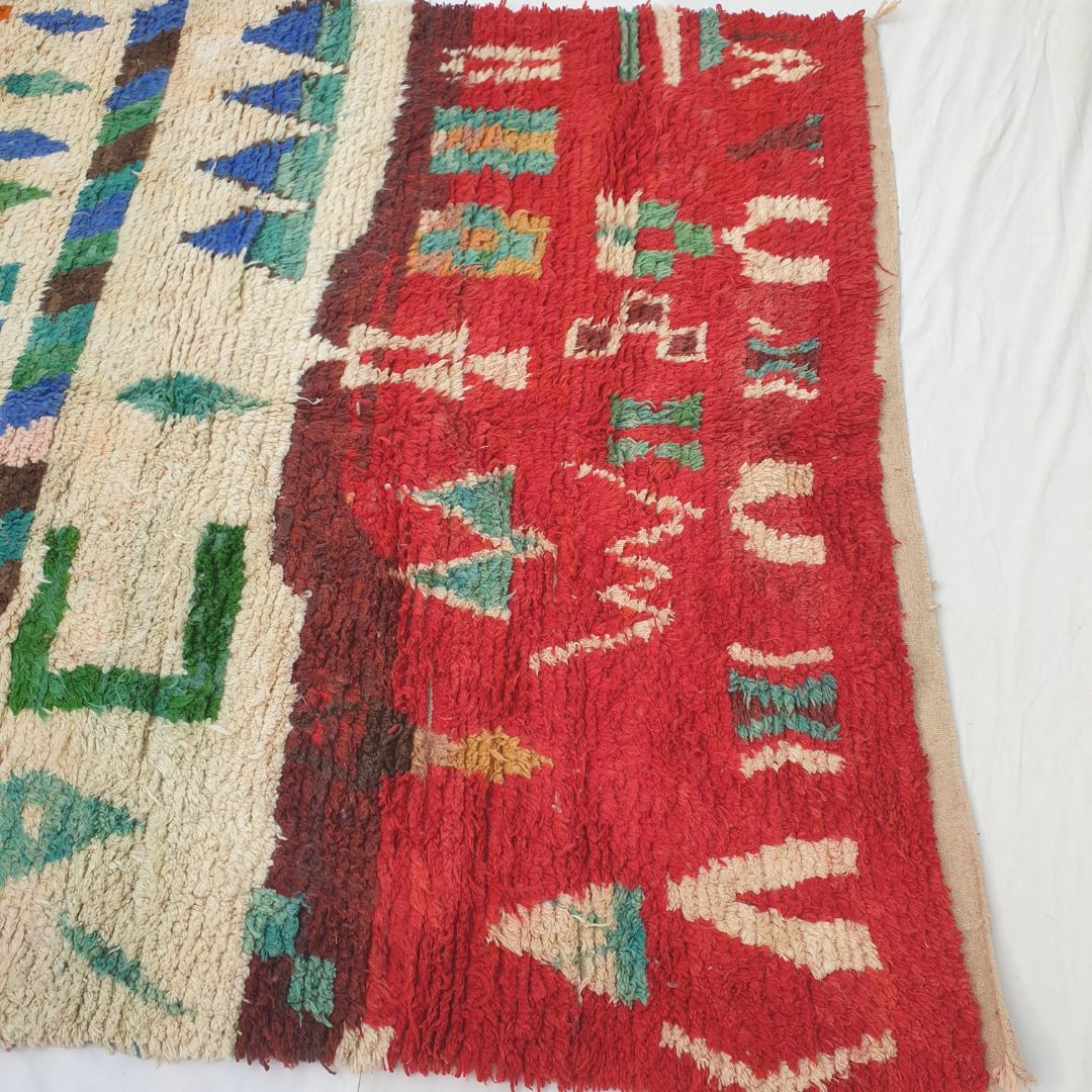 Soft plush wool pile and rich natural color variations of vibrant tribal abstract Boujad Berber Moroccan rug