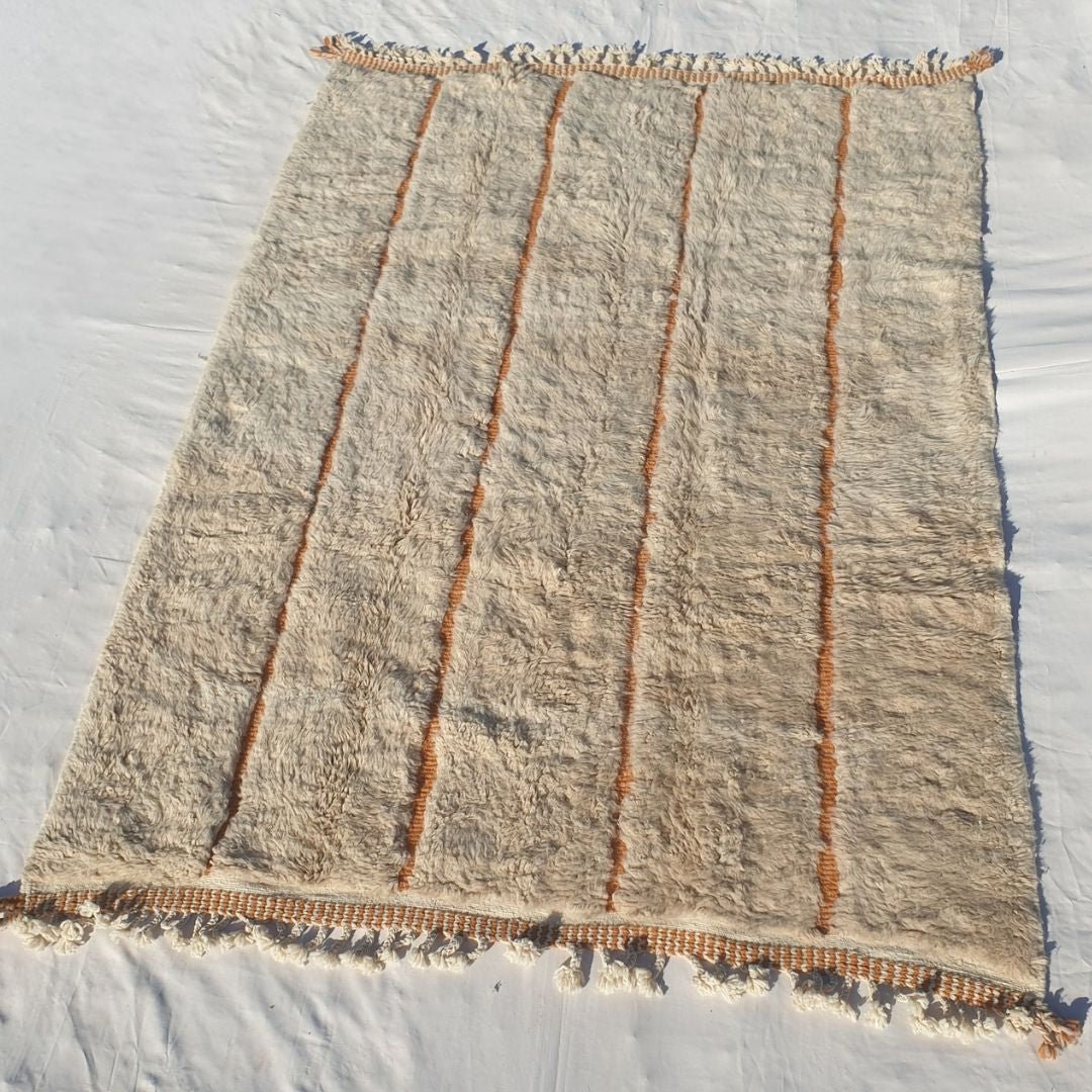 Dense plush pile and subtle ivory-orange warmth in this sumptuous Beni Ourain Berber carpet