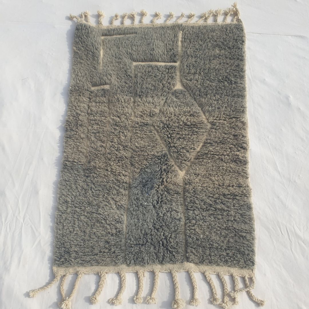 Authentic Beni Ourain Moroccan accent rug 100x145 cm laid flat - muted grey taupe wool base with an asymmetric dark architectural line composition, handwoven in Morocco by Beni Ourain Berber women