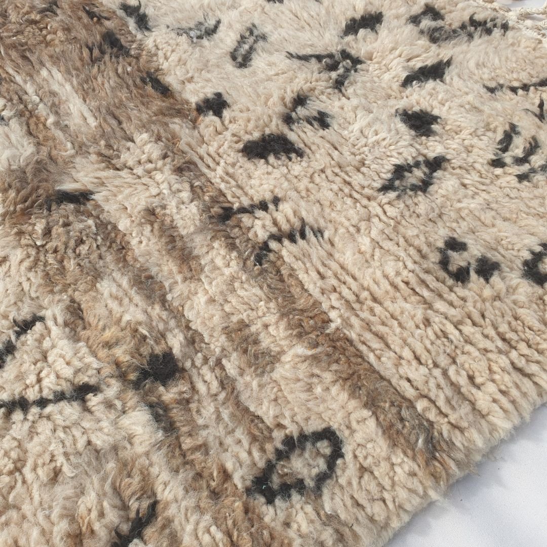 Ultra fluffy thick high-pile wool texture detail of plush Beni Ourain shag rug