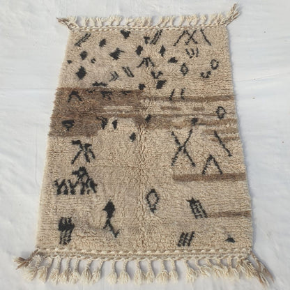 Dense plush pile and classic black Berber contrast in this sumptuous Beni Ourain carpet