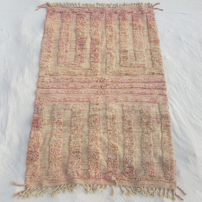 Authentic Beni Ourain Moroccan rug 148x237 cm laid flat - warm dusty rose blush pink wool base with a tonal geometric maze rectangular key pattern in two mirrored panels, handwoven in Morocco by Beni Ourain Berber women