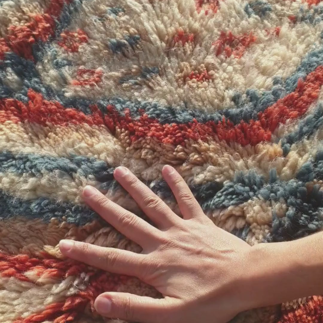 Full view of symmetrical geometric diamond design and fringed edges showing craftsmanship of this Beni Mrirt carpet