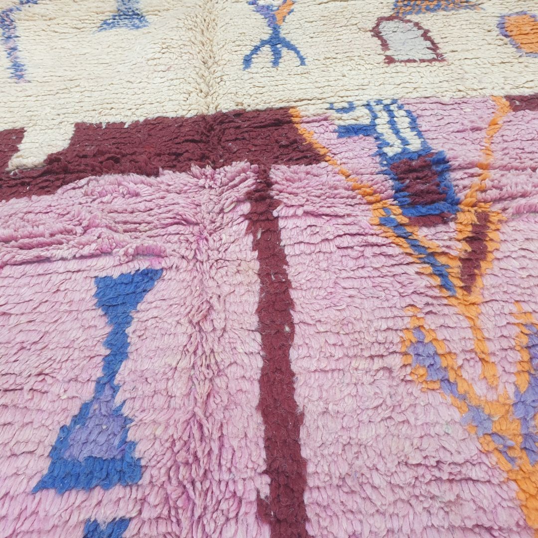 Tescla – 6x9 Moroccan Rug – Pink Ivory Boujad Berber Handwoven Wool Carpet with Blue Triangle & Figurative Symbols | 6'7"x9'7" Ft | 201x294 cm - OunizZ