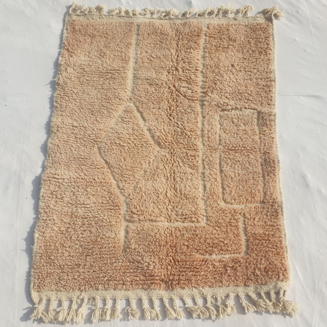 Authentic Beni Ourain Moroccan accent rug 104x144 cm laid flat - warm beige wool base with a carved diamond and rectangular relief pattern, handwoven in Morocco by Beni Ourain Berber women